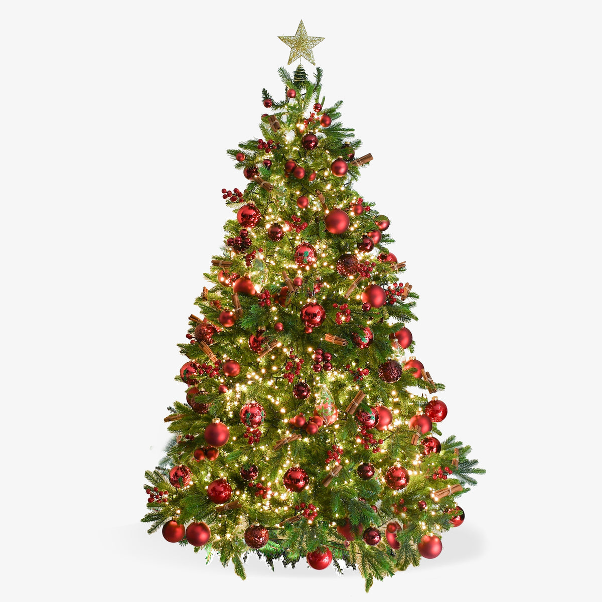 Moyses Stevens Traditional Christmas Tree decorated with red baubles, berries, cinnamon and natural pinecones
