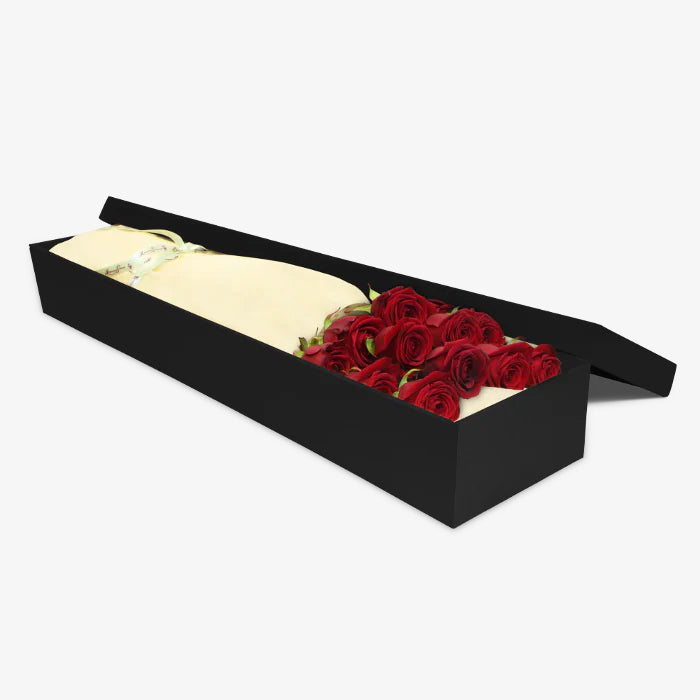 Red rose gift box by Moyses Stevens UAE featuring 12 premium red roses