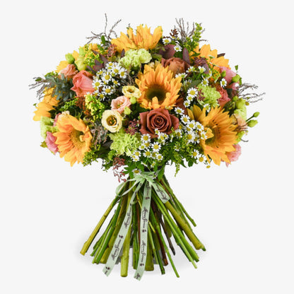 Café au Soleil luxury flower bouquet by Moyses Stevens UAE featuring golden sunflowers, barista roses, and peach lisianthus.