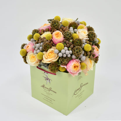 Moyses Stevens Brunia and Rose Christmas bouquet with garden roses and silver brunia